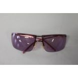 Gucci Rimless Style Sunglasses ? Purple/Lilac Tint with Gold frame. The inscription on the inside of