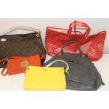 A job lot of assorted handbags (sold as seen)