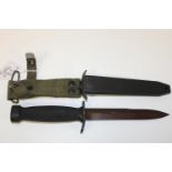 A military fighting knife & scabbard