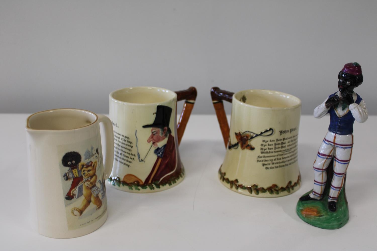 Two Crown Devon musical mugs & two other collectables