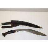 A WW1 period Kukri with wooden handle & leather scabbard, with belt attachment