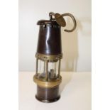 A baby Wolf miners safety lamp & associated pit check h19cm