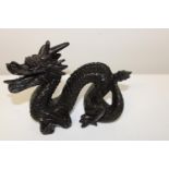 A Chinese dragon resin figurine 19x15cm