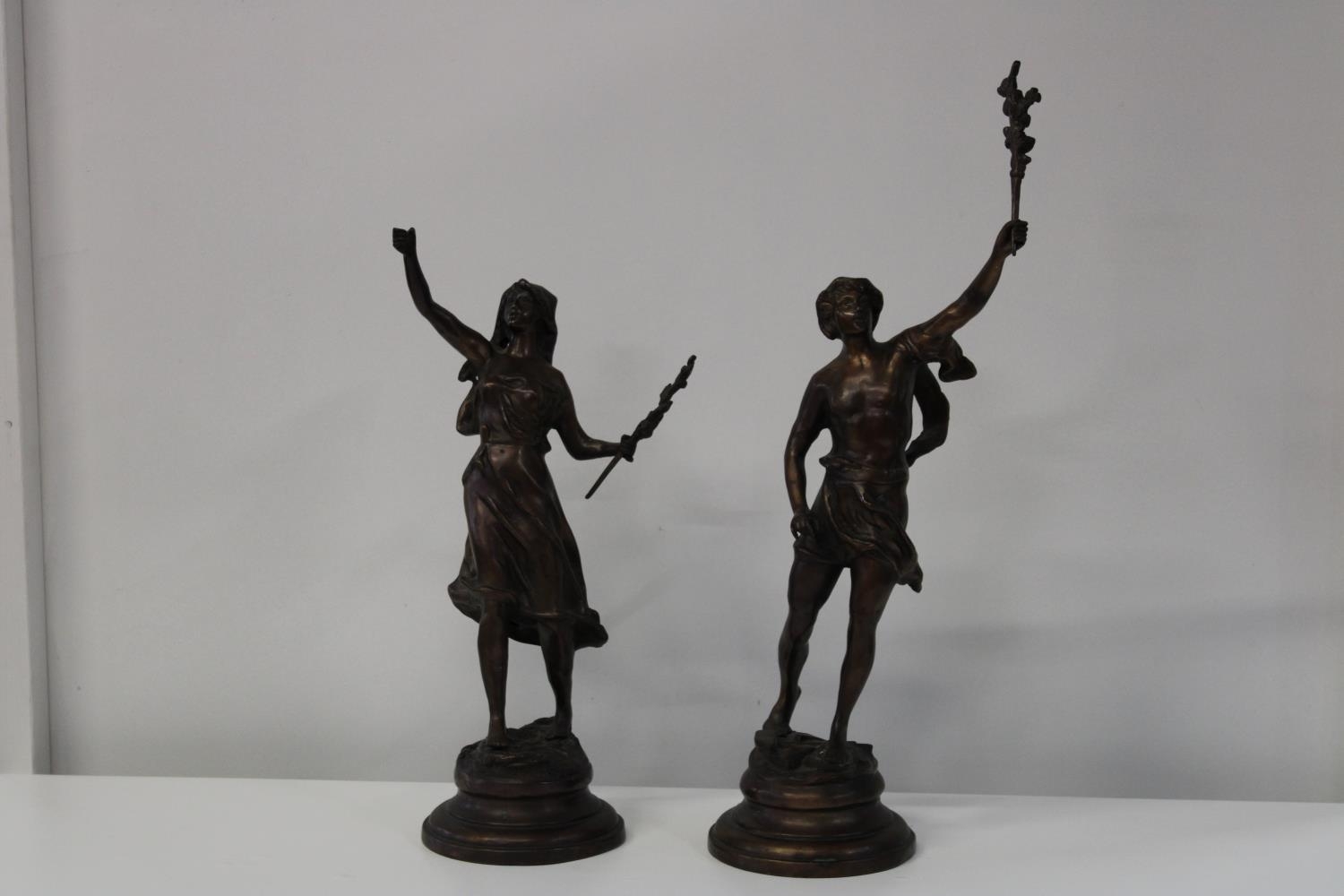 A pair of early 20th Century bronzes signed Rousseau h60cm