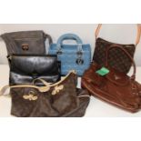 A job lot of assorted handbags (sold as seen)