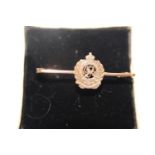 A 9ct gold Royal Engineers sweet heart brooch