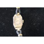 A Art Deco period 9ct gold bodied watch (as found)