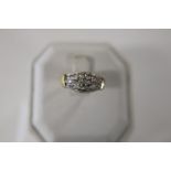 A 18ct gold & diamond cluster ring size N 1/2