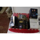 A box of Star Trek DVD's & other