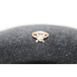 A 9ct gold diamond cluster ring (one stone missing)