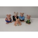A set of five NatWest piggy banks by Wade boxed