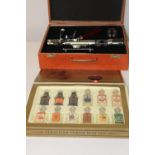 A boxed bar top wine bottle opener & box of minatures