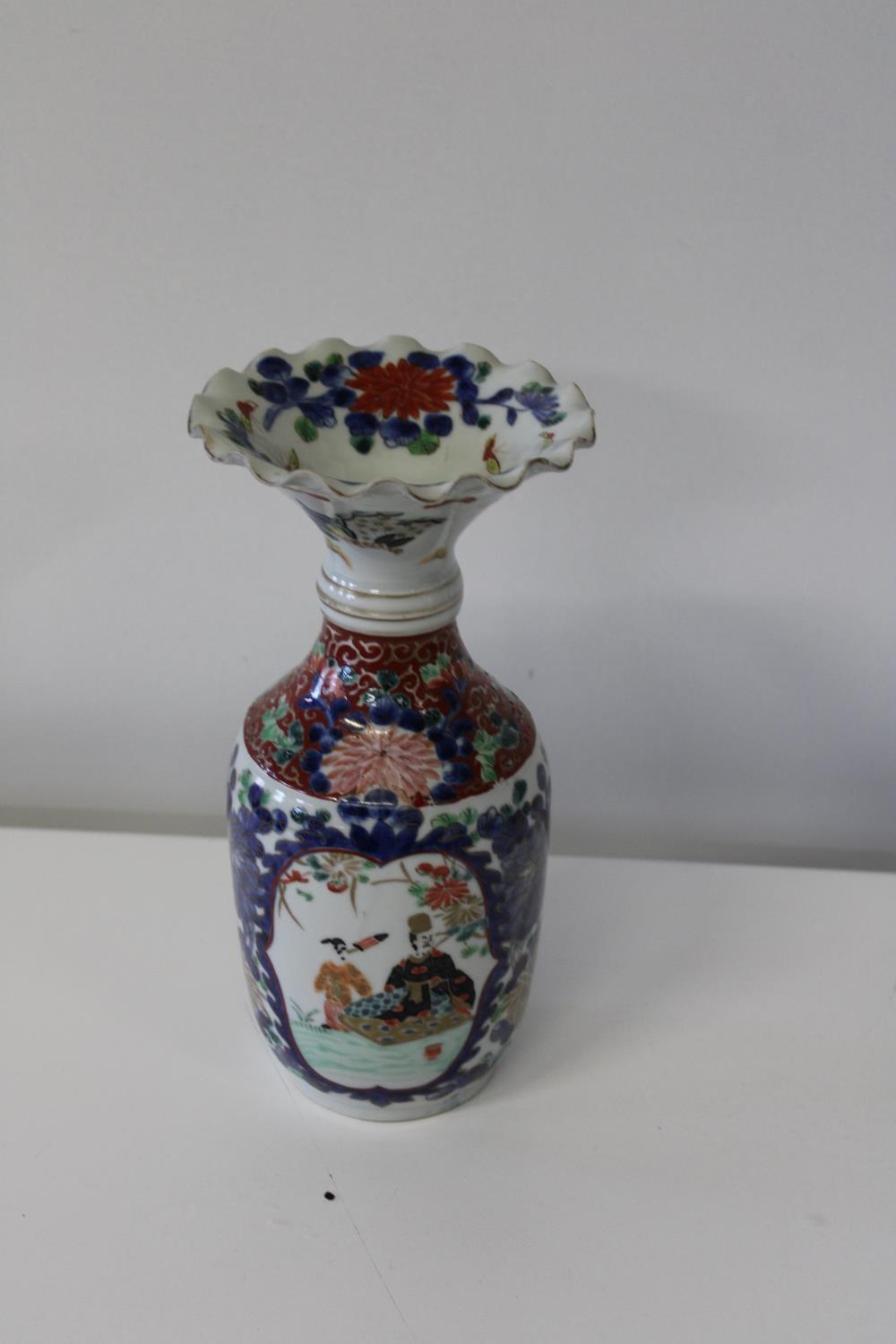 A hand painted Chinese vase with petal form rim & character marks to the base. (sold as seen) 29cm h