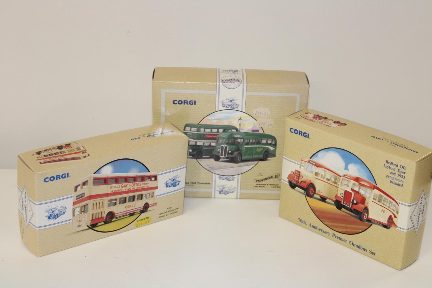 Three collectable Corgi die-cast bus models