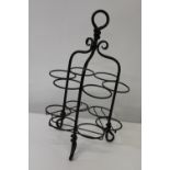 A vintage style metal wine bottle rack