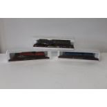 Three boxed locomotive models