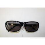 Chloe Black Sunglasses ? rectangular shape. The inscription on the arms reads: Chloe MADE IN