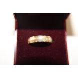 A 9ct gold patterned band ring size S 1/2