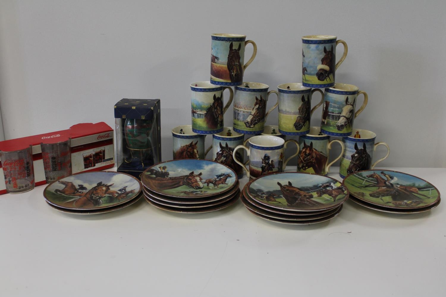 A box of horse racing related mugs & plates