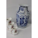 A large blue & white Oriental vase & three pieces of Modus bone china. vase 37cm h