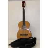 A Encore acoustic guitar + case. collection only