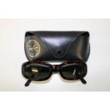Vintage Ray Ban ?Rituals? Sunglasses with case. RB etched on the left lens. Across the front of
