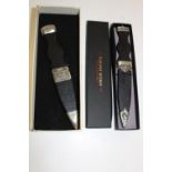 Two boxed Sgian Dubh's