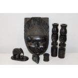 A good selection of carved African items. mask 34cm h