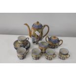 A vintage Japanese eggshell porcelain tea set