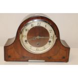 A working vintage walnut cased chiming mantel clock