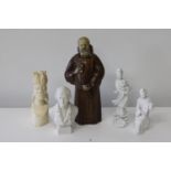 A selection of assorted figurines & monk form decanter
