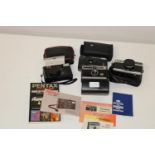 A selection of vintage cameras etc