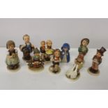 A shelf full of vintage Geobel figures (sold as seen)