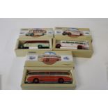 Three boxed Corgi bus models