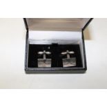 A pair of Sterling silver cufflinks