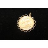 A 22ct gold 1893 Victorian full sovereign in a 9ct gold mount