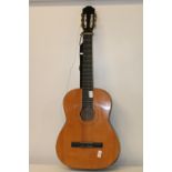 A Burswood acoustic guitar. collection only