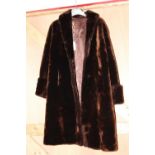 A faux fur Ladies coat. postage uk only