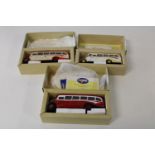 Three boxed Corgi bus models