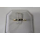 A 18ct gold & diamond trilogy ring size Q