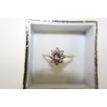 A 9ct gold amethyst cluster ring size O 1/2