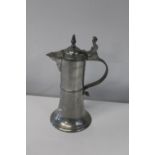 A stylish German pewter lidded jug. 30cm tall