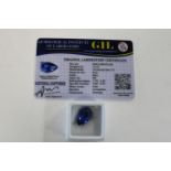 A sapphire gem stone with cert