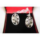 A pair of new Viventy silver earrings with floral design with crystals