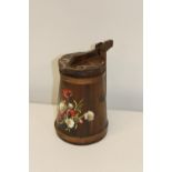 A bargeware style lidded wooden jug. 27cm tall