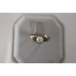 A 9ct pearl & diamond set ring size L