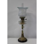 A quality Victorian brass & glass oil lamp, on a adjustable column and with a Hinks lever