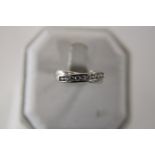 A 9ct white gold crossover ring size N 1/4