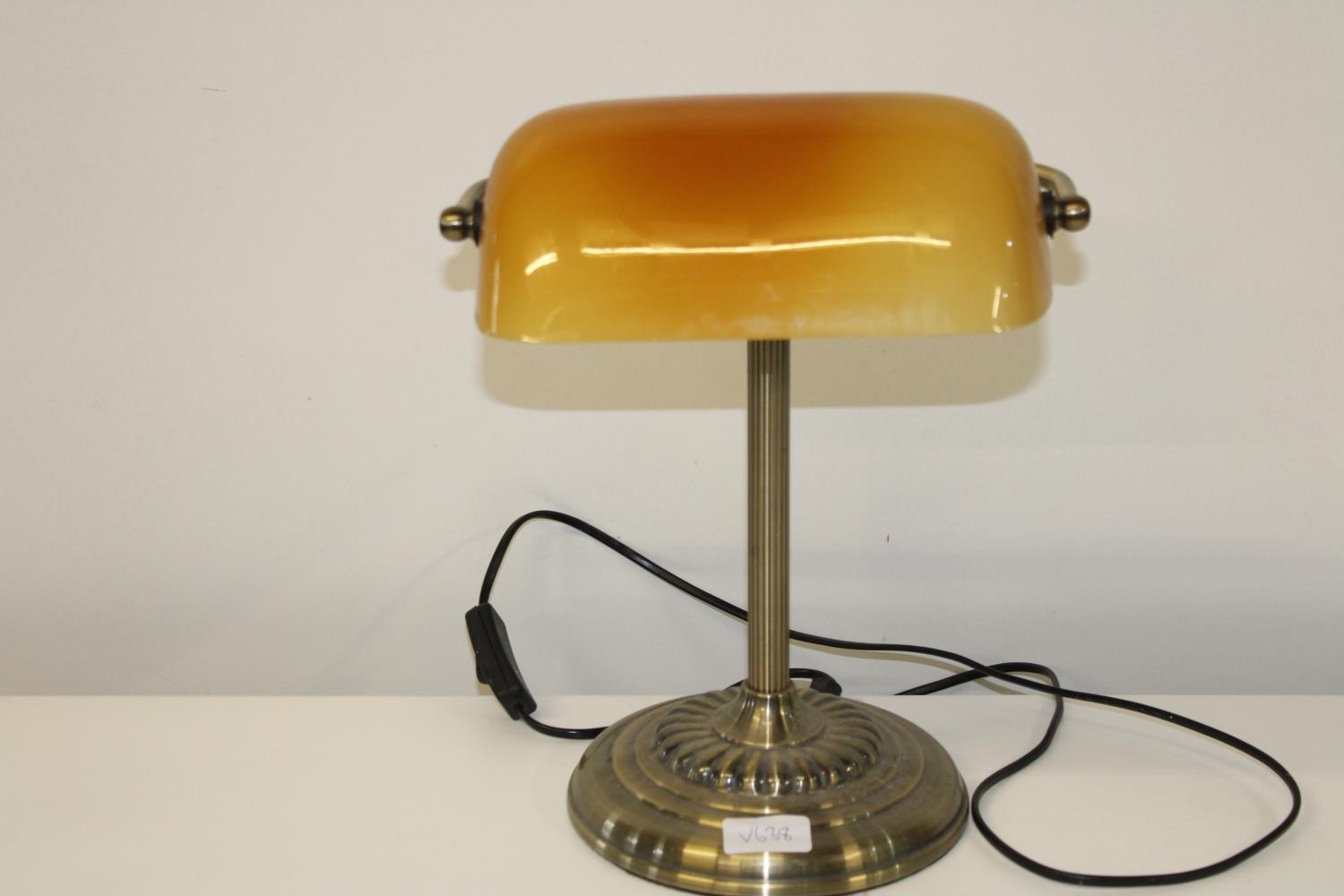 A vintage style bankers lamp