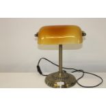 A vintage style bankers lamp